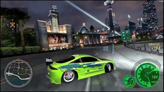 فن الغلاف للعبة Need for Speed ​​Underground 2، يظهر سيارة أنيقة تتسابق عبر مشهد مدينة مضاء بالنيون في الليل.