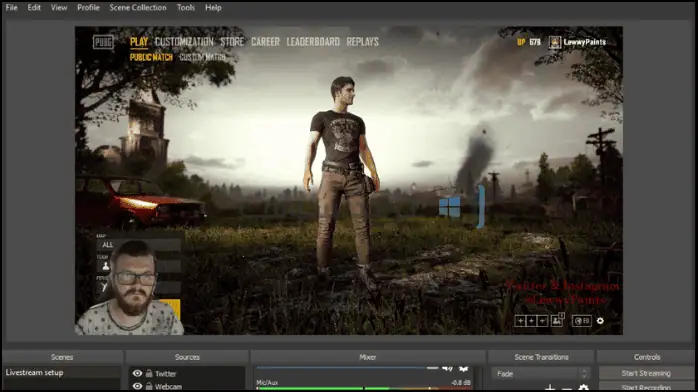 إعداد كمبيوتر سطح المكتب يعرض واجهة برنامج OBS مع عناصر تحكم وإعدادات بث مختلفة مرئية على الشاشة.